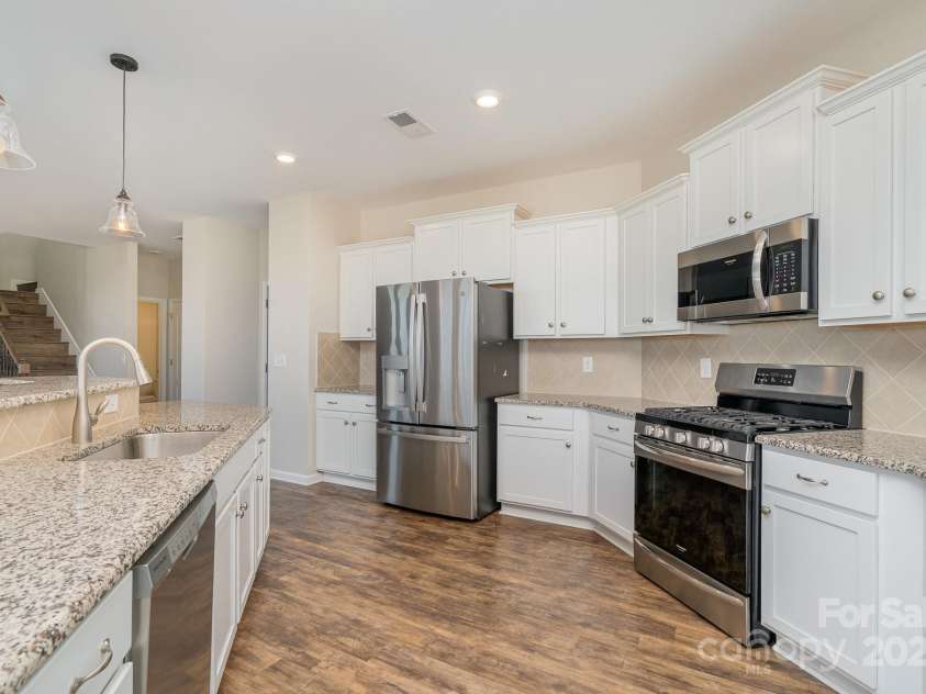 1878 Sapphire Meadow Drive, Fort Mill, SC 29715.  MLS# CAR4209802, YatesRealty ID 4485. Large open kitchen