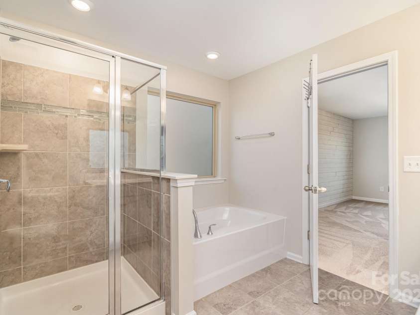 1878 Sapphire Meadow Drive, Fort Mill, SC 29715.  MLS# CAR4209802, YatesRealty ID 4485. Primary bathroom