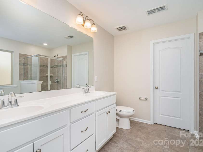 1878 Sapphire Meadow Drive, Fort Mill, SC 29715.  MLS# CAR4209802, YatesRealty ID 4485. Primary bathroom