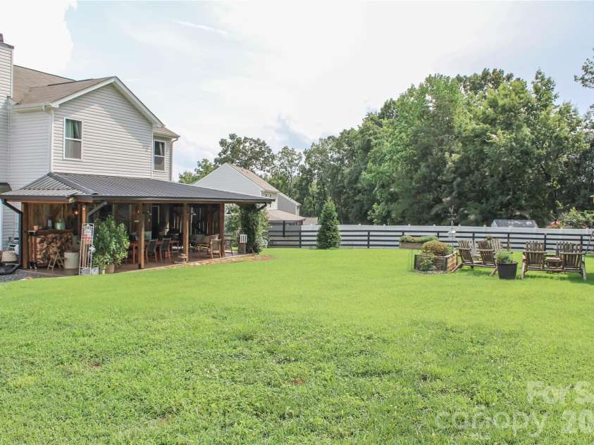 120 Dublin Court, Statesville, NC 28677.  MLS# CAR4412798, YatesRealty ID 44855. Back yard from back left corner