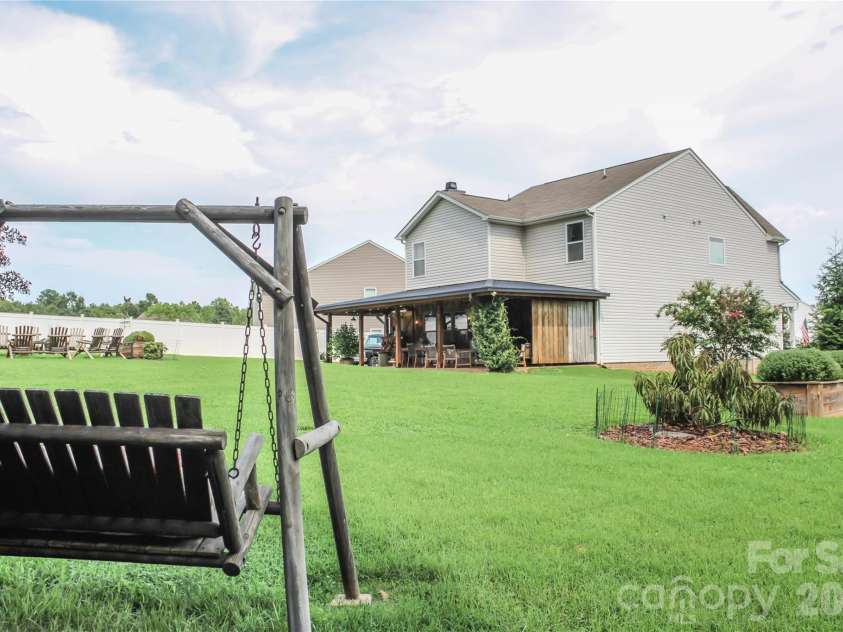 120 Dublin Court, Statesville, NC 28677.  MLS# CAR4412798, YatesRealty ID 44855. Back yard from back right corner