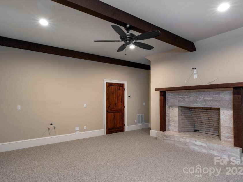 628 Rock Ledge Lane, Linville, NC 28646.  MLS# CAR4230974, YatesRealty ID 4486. Lower Level Family Room