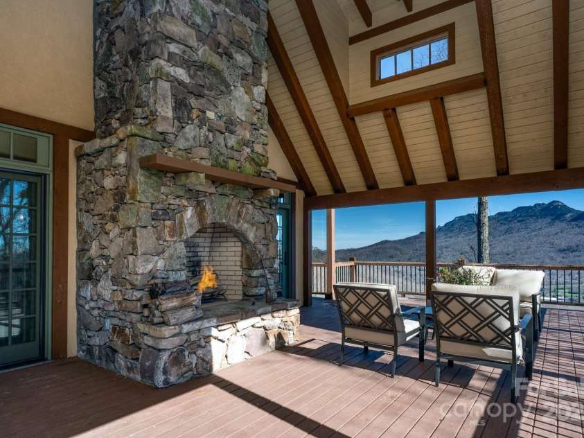 628 Rock Ledge Lane, Linville, NC 28646.  MLS# CAR4230974, YatesRealty ID 4486. Wood Burning With Gas Starter