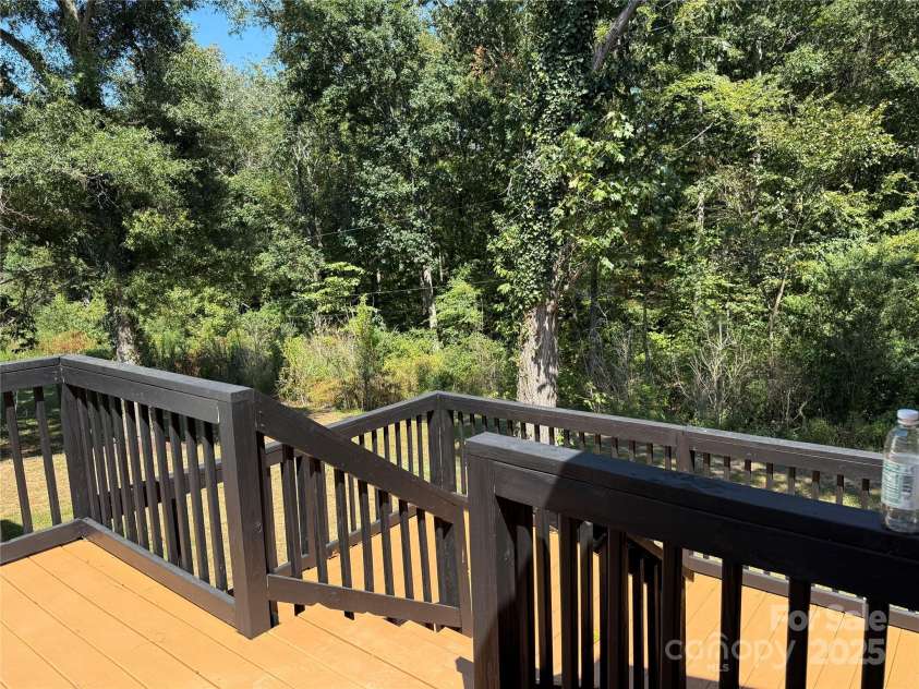 2611 Bobwhite Circle, Wingate, NC 28174.  MLS# CAR4299855, YatesRealty ID 4487. Large two-level backyard deck 