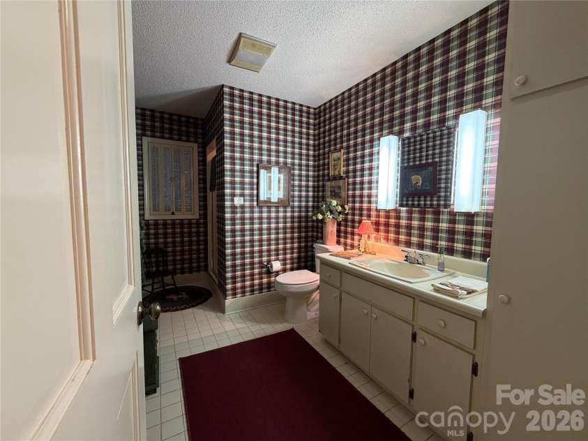7795 Hwy 226a Highway, Little Switzerland, NC 28749.  MLS# CAR4408034, YatesRealty ID 44881. Hall bath