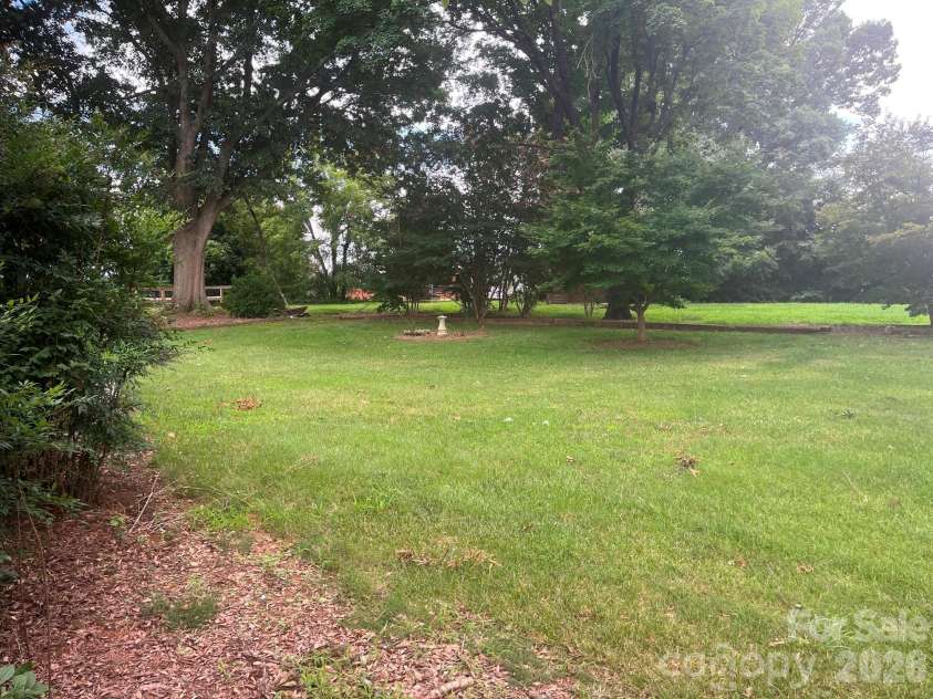 348 Hillsboro Road, Taylorsville, NC 28681.  MLS# CAR4405883, YatesRealty ID 44889. Back yard