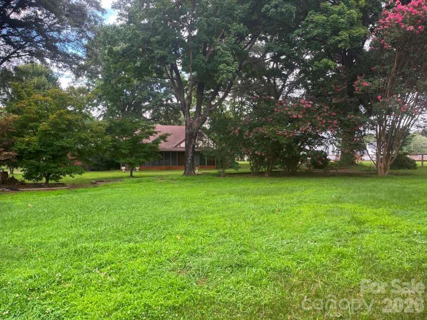 348 Hillsboro Road, Taylorsville, NC 28681.  MLS# CAR4405883, YatesRealty ID 44889. Back yard