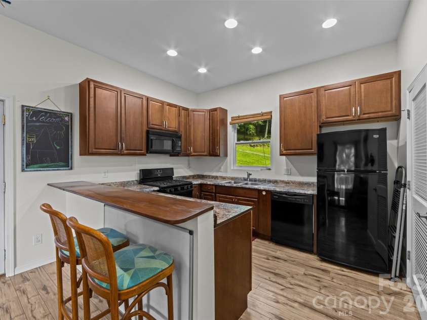 263 Pilgrims Lane, Burnsville, NC 28714.  MLS# CAR4415371, YatesRealty ID 44896. 2nd Living Space Kitchen