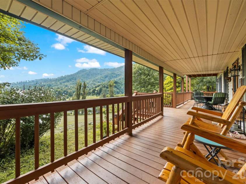 263 Pilgrims Lane, Burnsville, NC 28714.  MLS# CAR4415371, YatesRealty ID 44896. Large Front Covered Porch