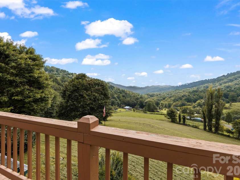 263 Pilgrims Lane, Burnsville, NC 28714.  MLS# CAR4415371, YatesRealty ID 44896. Long range view from Primary Bedroom Deck