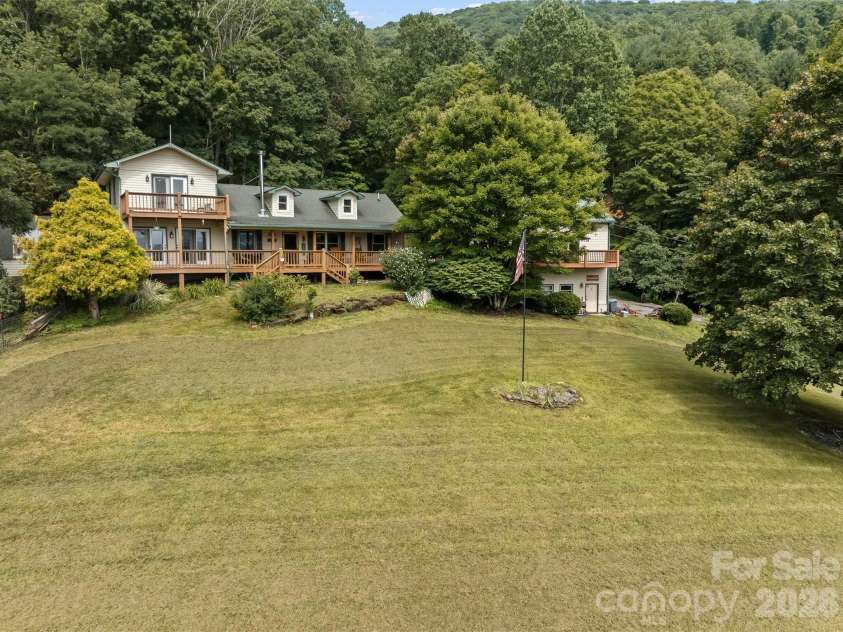 263 Pilgrims Lane, Burnsville, NC 28714.  MLS# CAR4415371, YatesRealty ID 44896. Main Home and Front Yard area