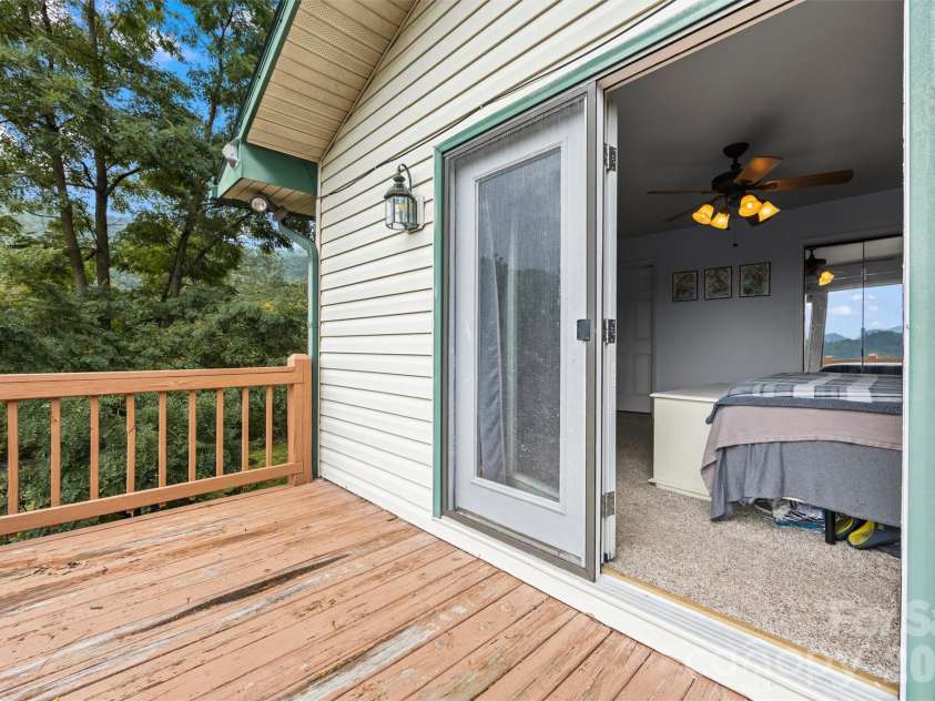 263 Pilgrims Lane, Burnsville, NC 28714.  MLS# CAR4415371, YatesRealty ID 44896. Primary Suite with private deck
