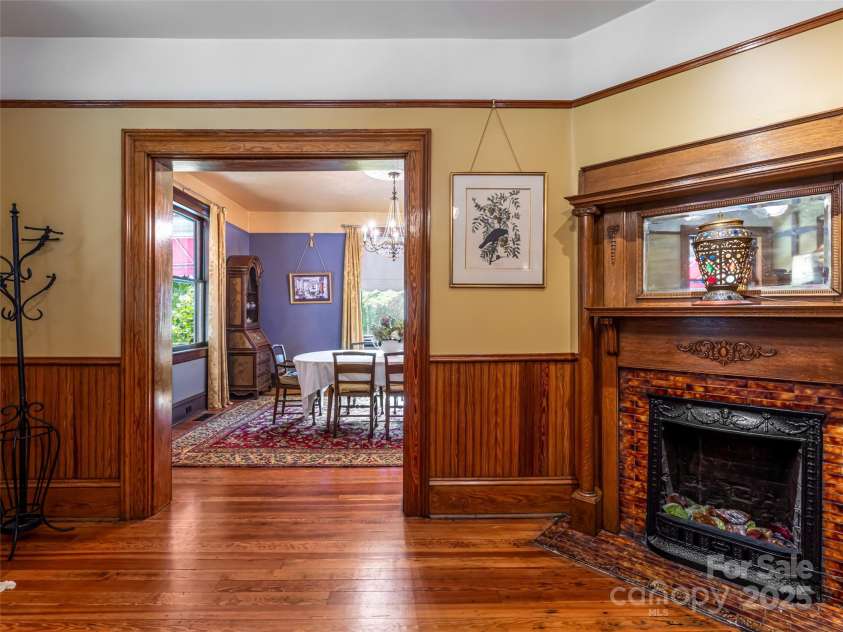 9 West Street Extension, Asheville, NC 28801.  MLS# CAR4299248, YatesRealty ID 44904. Five decorative tile fireplaces throughout