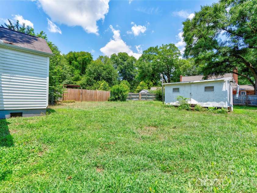 811 Kings Road, Shelby, NC 28150.  MLS# CAR4399686, YatesRealty ID 44907. Back Yard/ Storage Building