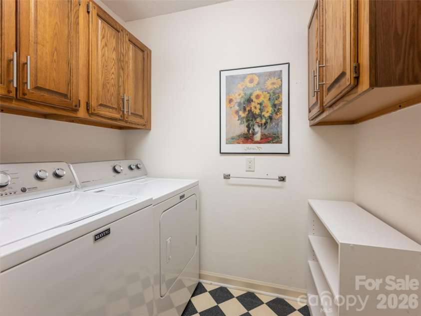 112 Live Oak Lane, Hendersonville, NC 28791.  MLS# CAR4393997, YatesRealty ID 44924. Laundry Room conveniently located off the kitchen