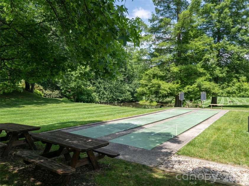 112 Live Oak Lane, Hendersonville, NC 28791.  MLS# CAR4393997, YatesRealty ID 44924. Shuffleboard anyone?