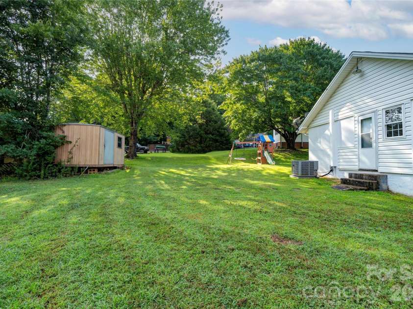 218 Oxford Street, Spindale, NC 28160.  MLS# CAR4414894, YatesRealty ID 44929. Side Yard