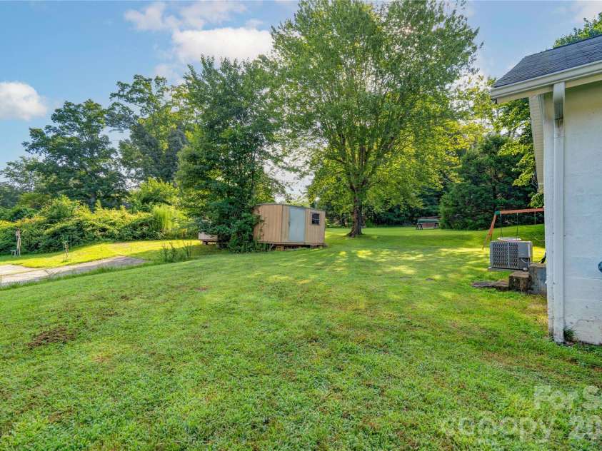 218 Oxford Street, Spindale, NC 28160.  MLS# CAR4414894, YatesRealty ID 44929. Side Yard