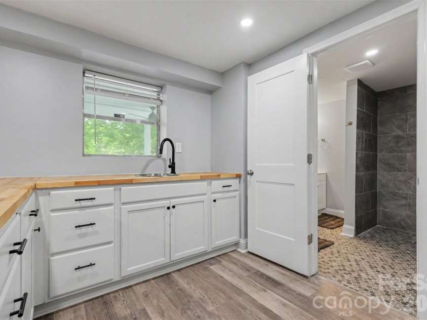 6917 Navajo Trail, Sherrills Ford, NC 28673.  MLS# CAR4394650, YatesRealty ID 44932. Kitchenette in basement