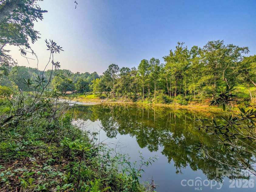 328 Wooded Valley Lane, Burnsville, NC 28714.  MLS# CAR4409092, YatesRealty ID 44933. Additional View of South Toe River Frontage!