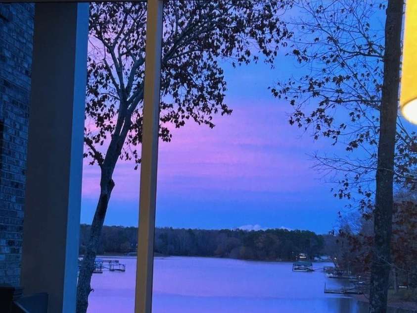 1075 Lakefront Woods Drive, Belmont, NC 28012.  MLS# CAR4402621, YatesRealty ID 44942. Glorious sunset view