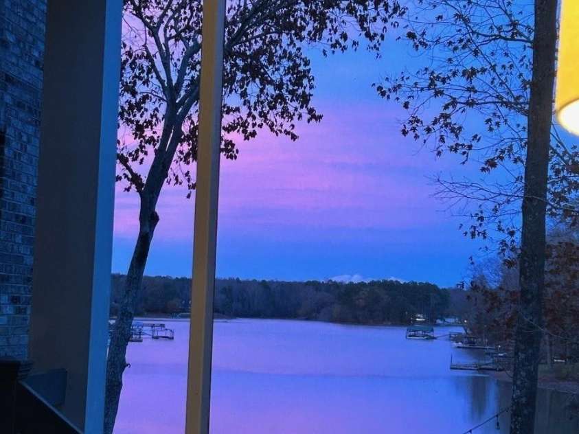 1075 Lakefront Woods Drive, Belmont, NC 28012.  MLS# CAR4402621, YatesRealty ID 44942. Glorious sunset view