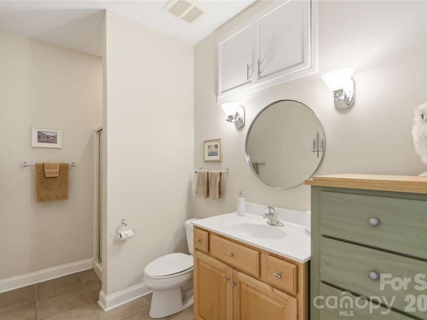1075 Lakefront Woods Drive, Belmont, NC 28012.  MLS# CAR4402621, YatesRealty ID 44942. Lower level full bath