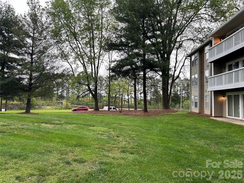 1645 Arlyn Circle, Charlotte, NC 28213.  MLS# CAR4404772, YatesRealty ID 44948. Back of bldg