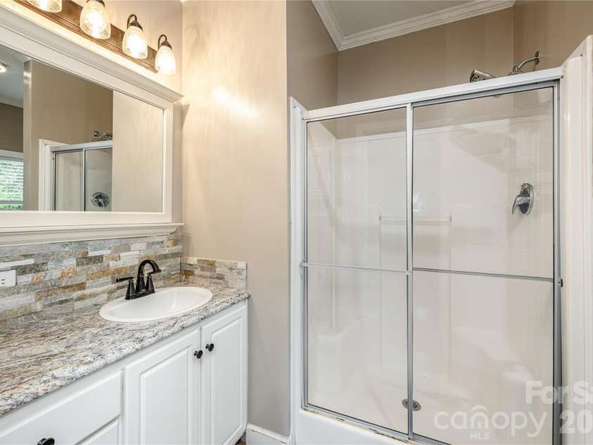 8 Blaines Way, Candler, NC 28715.  MLS# CAR4406500, YatesRealty ID 44964. Primary bathroom