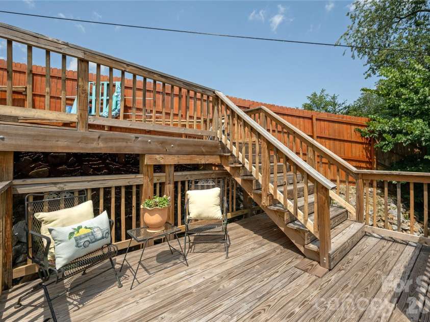 8 Blaines Way, Candler, NC 28715.  MLS# CAR4406500, YatesRealty ID 44964. Upper level deck