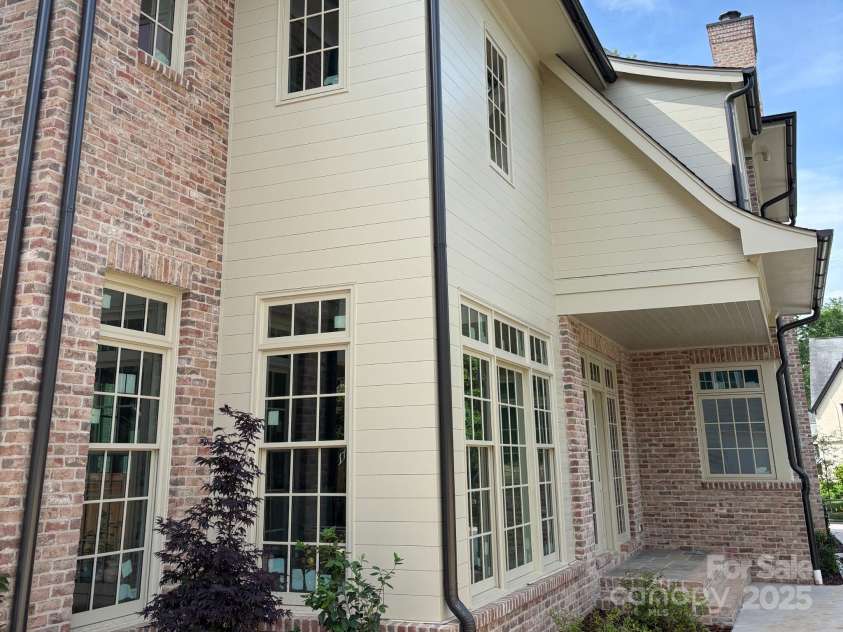 1969 Maryland Avenue, Charlotte, NC 28209.  MLS# CAR4129352, YatesRealty ID 4497. Side Exterior