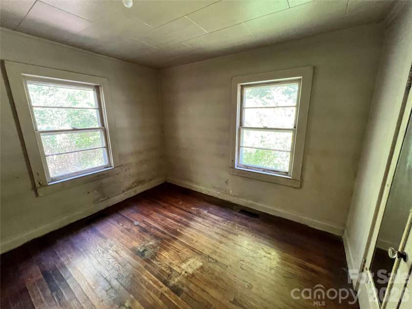 215 Factory Street, Biscoe, NC 27209.  MLS# CAR4415538, YatesRealty ID 44981. Bedroom 1