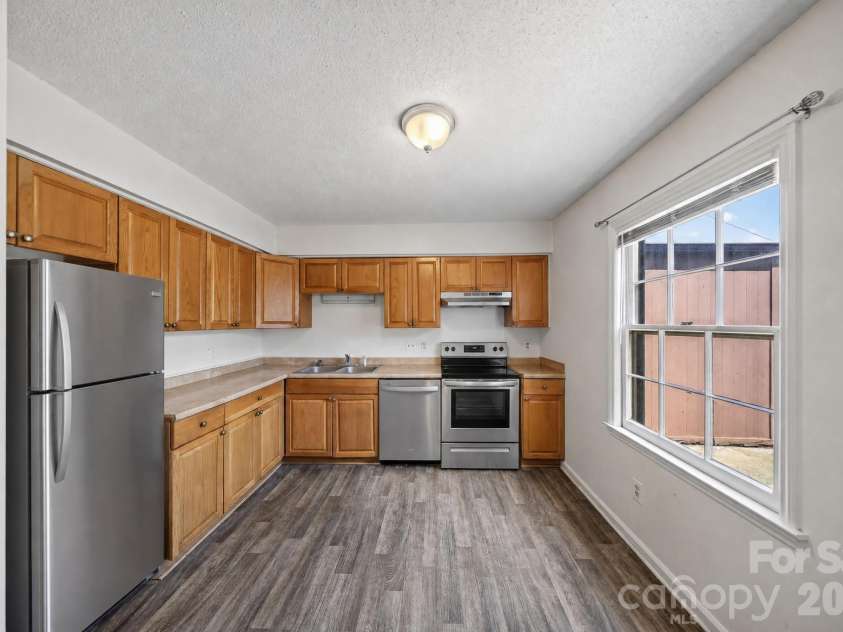 6835 Farmingdale Drive, Charlotte, NC 28212.  MLS# CAR4412722, YatesRealty ID 44983. Staged