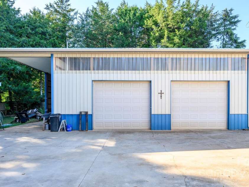 114 Harness Lane, Mocksville, NC 27028.  MLS# CAR4300524, YatesRealty ID 45. Carport Overhang