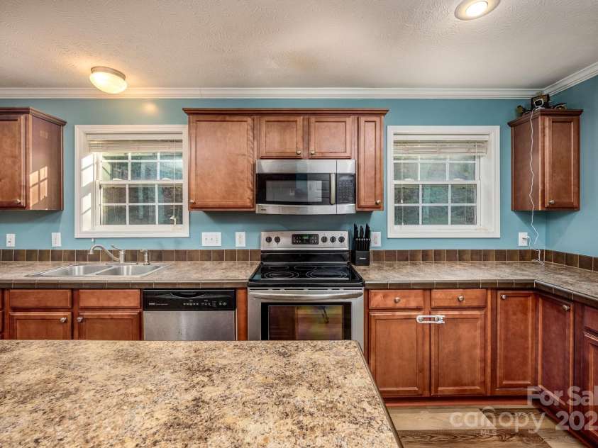 114 Harness Lane, Mocksville, NC 27028.  MLS# CAR4300524, YatesRealty ID 45. Kitchen w/Stainless Appliances