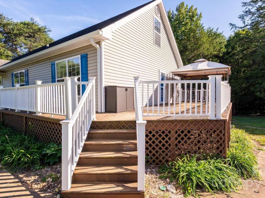 114 Harness Lane, Mocksville, NC 27028.  MLS# CAR4300524, YatesRealty ID 45. Large Side Deck For Entertaining