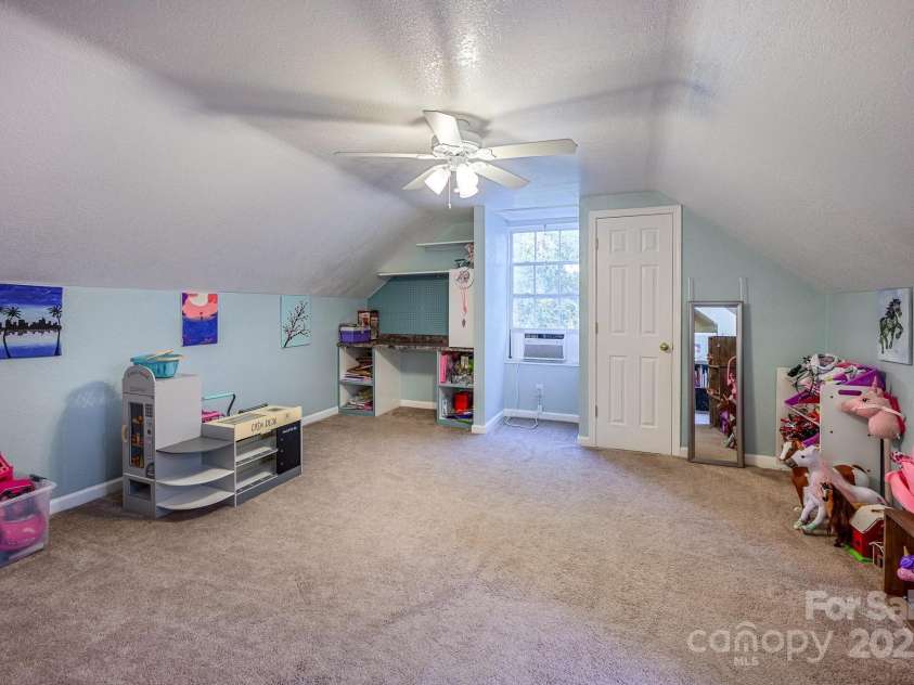 114 Harness Lane, Mocksville, NC 27028.  MLS# CAR4300524, YatesRealty ID 45. Upstairs Playroom