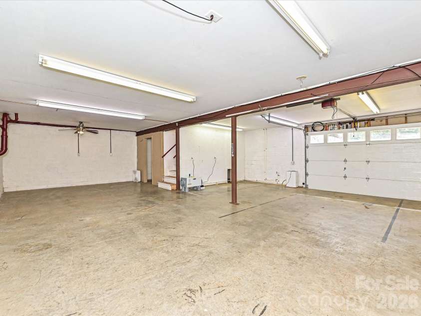 511 Manchester Road, Mount Gilead, NC 27306.  MLS# CAR4406596, YatesRealty ID 45001. Basement Garage