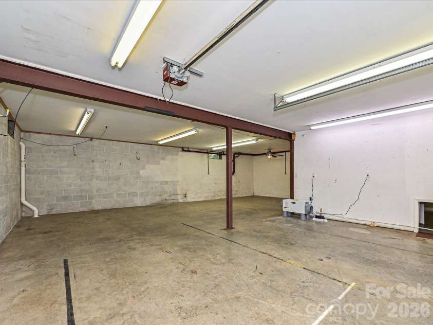 511 Manchester Road, Mount Gilead, NC 27306.  MLS# CAR4406596, YatesRealty ID 45001. Basement Garage