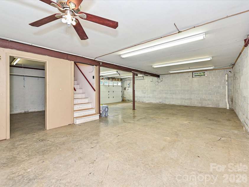 511 Manchester Road, Mount Gilead, NC 27306.  MLS# CAR4406596, YatesRealty ID 45001. Basement Garage