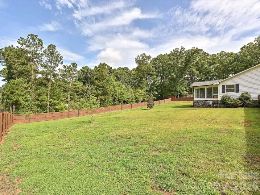 511 Manchester Road, Mount Gilead, NC 27306.  MLS# CAR4406596, YatesRealty ID 45001. HUGE Backyard!