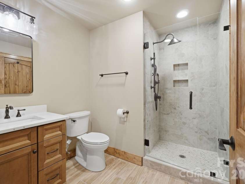 761 Foxfire Drive, Banner Elk, NC 28604.  MLS# CAR4415541, YatesRealty ID 45002. Guest Bathroom on second level.
