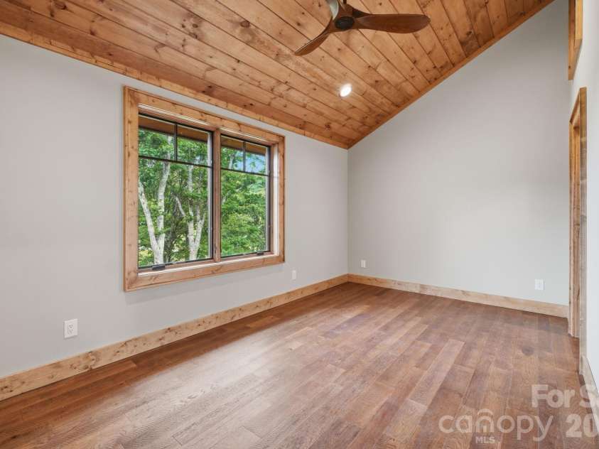 761 Foxfire Drive, Banner Elk, NC 28604.  MLS# CAR4415541, YatesRealty ID 45002. Guest Bedroom on second floor.