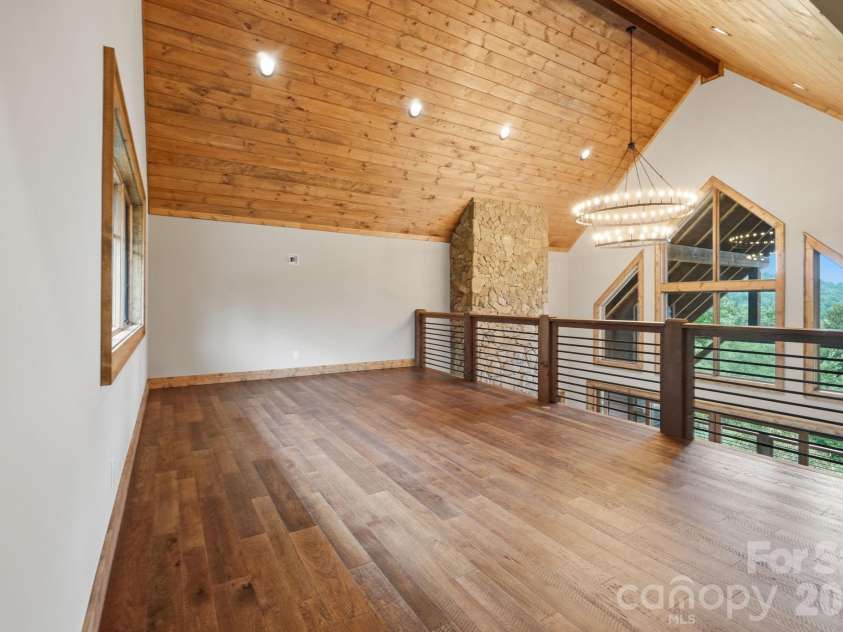 761 Foxfire Drive, Banner Elk, NC 28604.  MLS# CAR4415541, YatesRealty ID 45002. Open loft overlooking the living area.