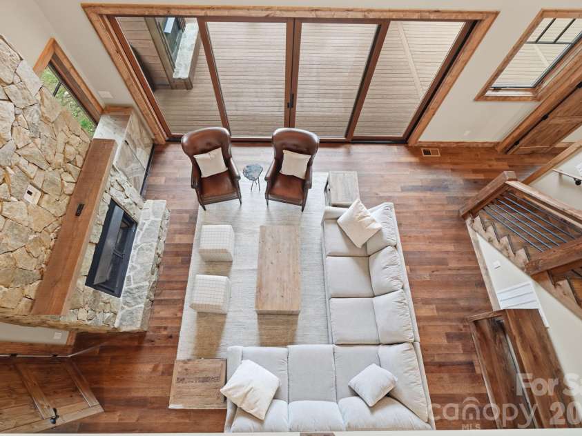 761 Foxfire Drive, Banner Elk, NC 28604.  MLS# CAR4415541, YatesRealty ID 45002. Open loft overlooking the living area.