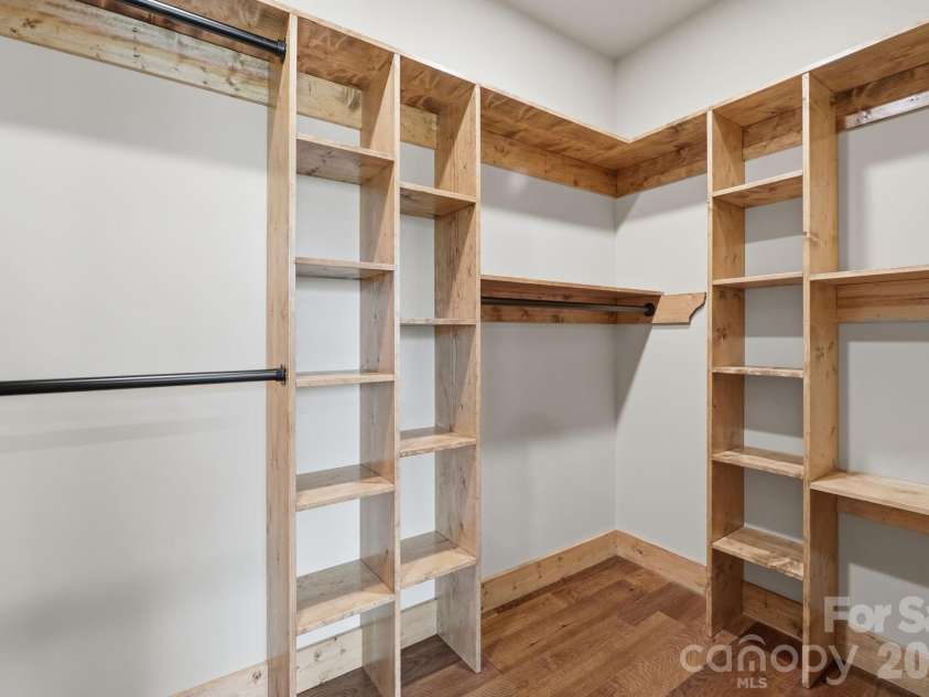 761 Foxfire Drive, Banner Elk, NC 28604.  MLS# CAR4415541, YatesRealty ID 45002. Owners Retreat walk-in closet.