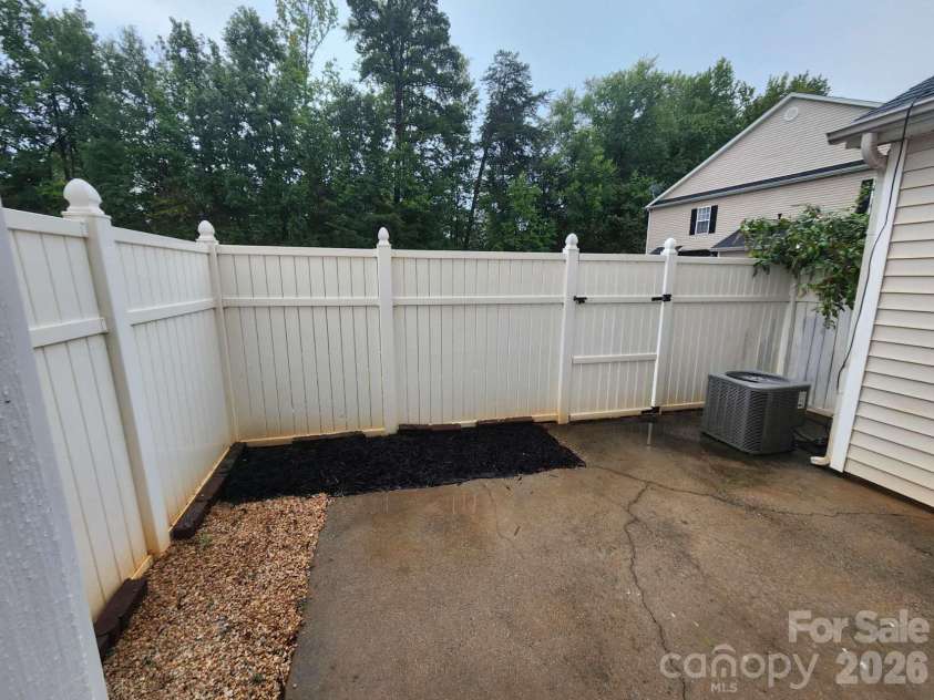 9644 Littleleaf Drive, Charlotte, NC 28215.  MLS# CAR4415285, YatesRealty ID 45026. Fence patio