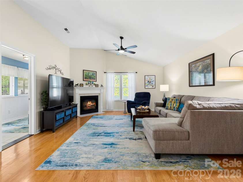 196 Snowy Egret Way, Hendersonville, NC 28792.  MLS# CAR4414886, YatesRealty ID 45031. Cathedral ceilings and cozy vented gas fireplace
