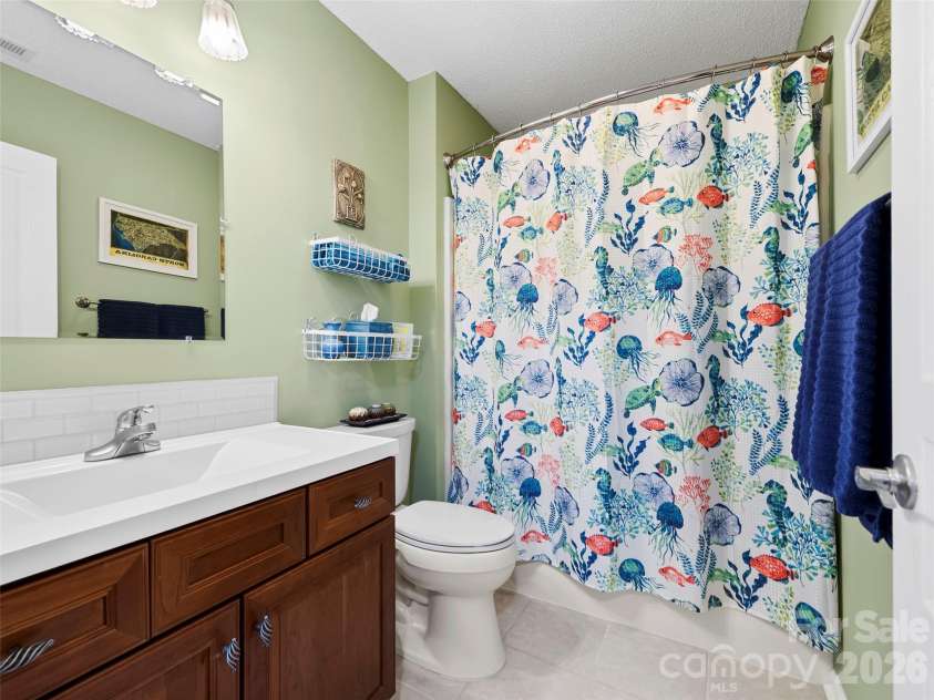 196 Snowy Egret Way, Hendersonville, NC 28792.  MLS# CAR4414886, YatesRealty ID 45031. Guest Bathroom