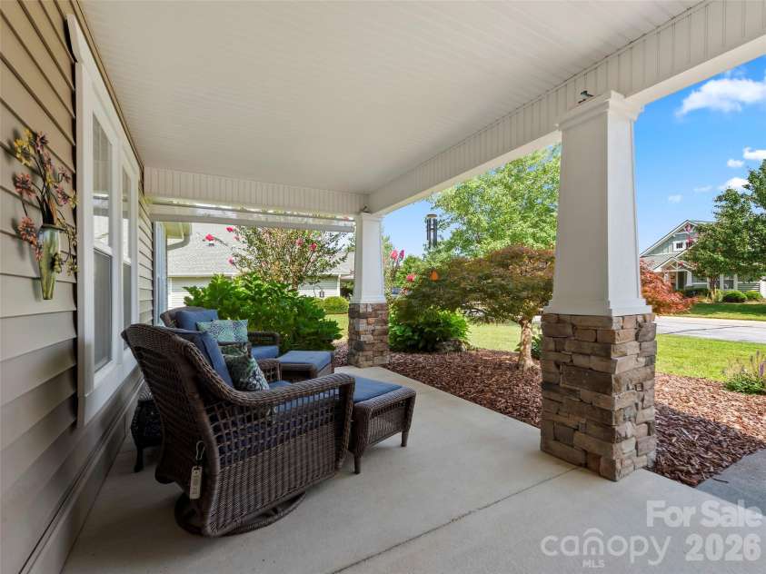196 Snowy Egret Way, Hendersonville, NC 28792.  MLS# CAR4414886, YatesRealty ID 45031. Spacious Front Patio with partial mountain views